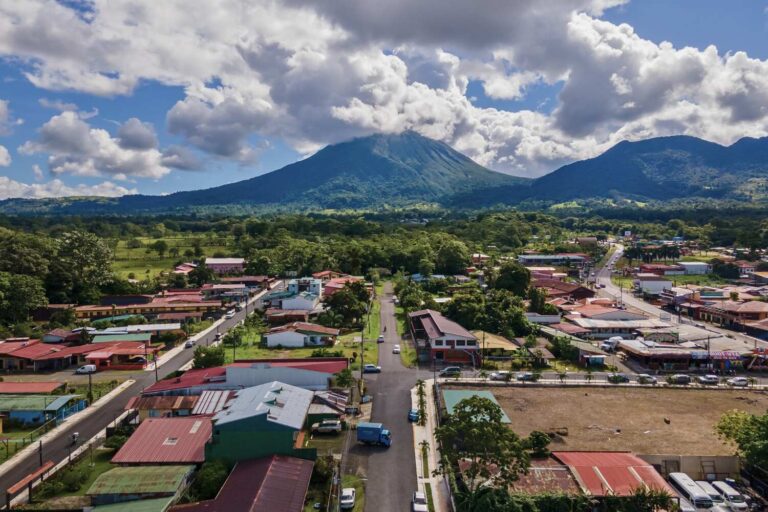 Aerial view of La Fortuna town and Arenal Volcano.