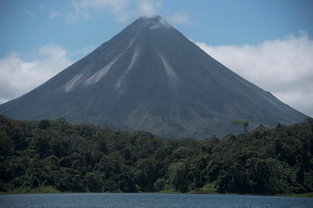 Arenal Volcano with forest and lake in La Fortuna Costa Rica