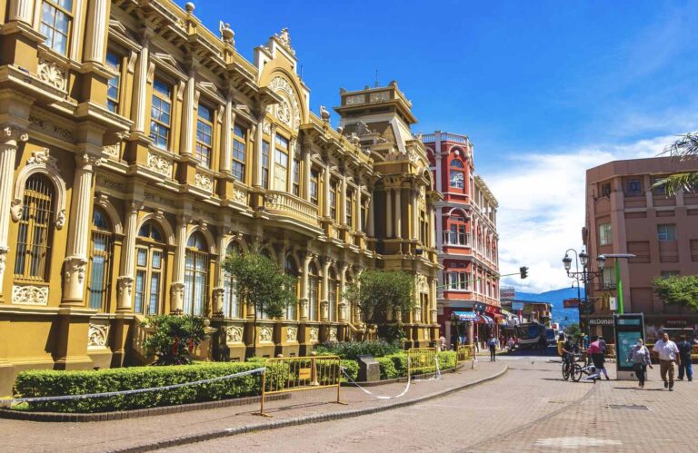 Colorful street with buildings houses architecture and people in Merced San José Costa Rica