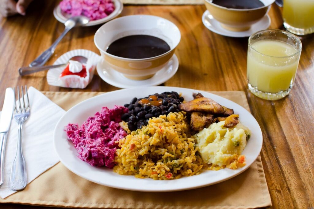 Traditional Costa Rican lunch with rice, beans, and salad.